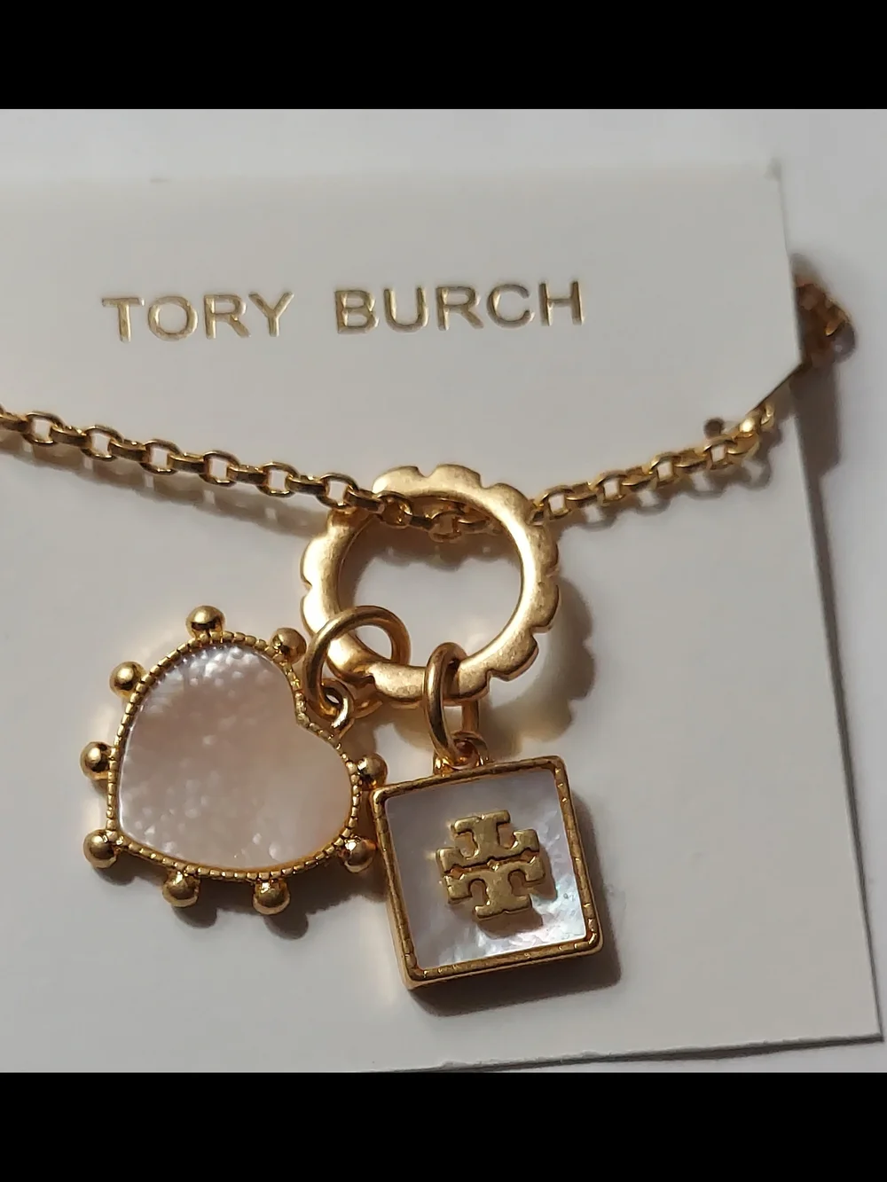 Tory Burch Gold Necklace with White Mother-of-Pearl Heart & Logo Charms